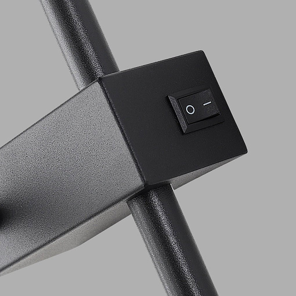 Integrated on-off switch detail shown on the body of a dual light wall sconce.