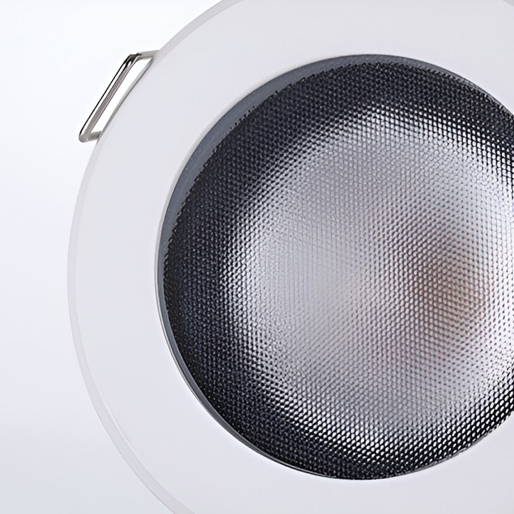 Product close-up showing white trim elite lighting can lights with textured reflector.