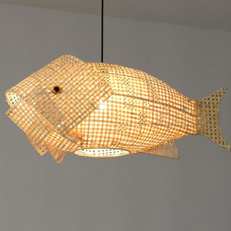 Close-up of fish pendant light showcasing its intricate woven rattan design.