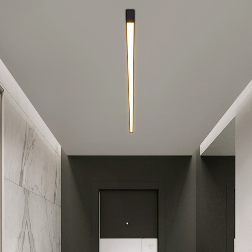 Flush mount linear ceiling light providing uniform lighting in modern interior.