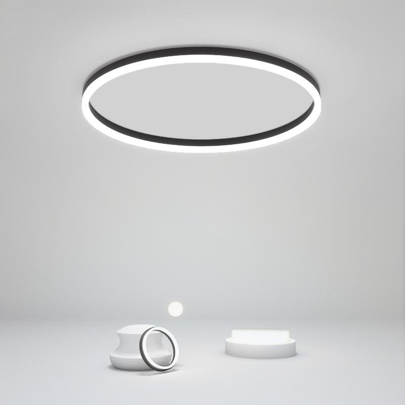 Flush mount ring light providing ambient lighting in a modern interior.