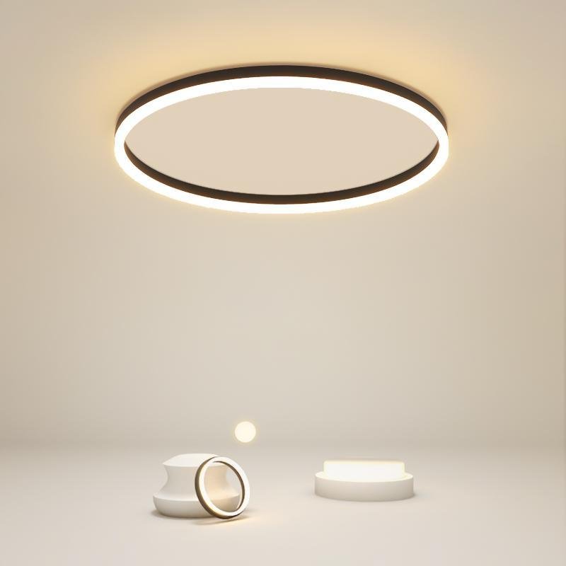 Flush mount ring light with a minimalist design, mounted on a white ceiling.
