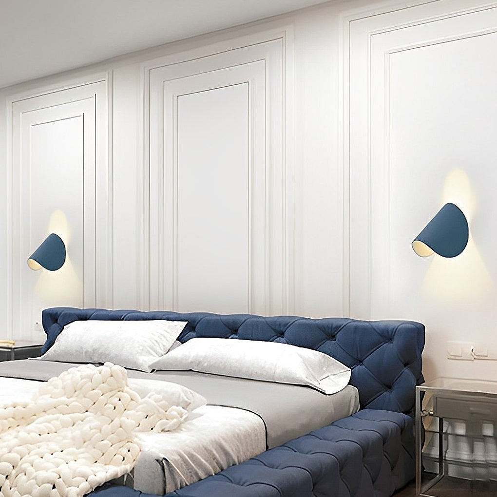 Folding wall sconce providing elegant illumination for a contemporary study.