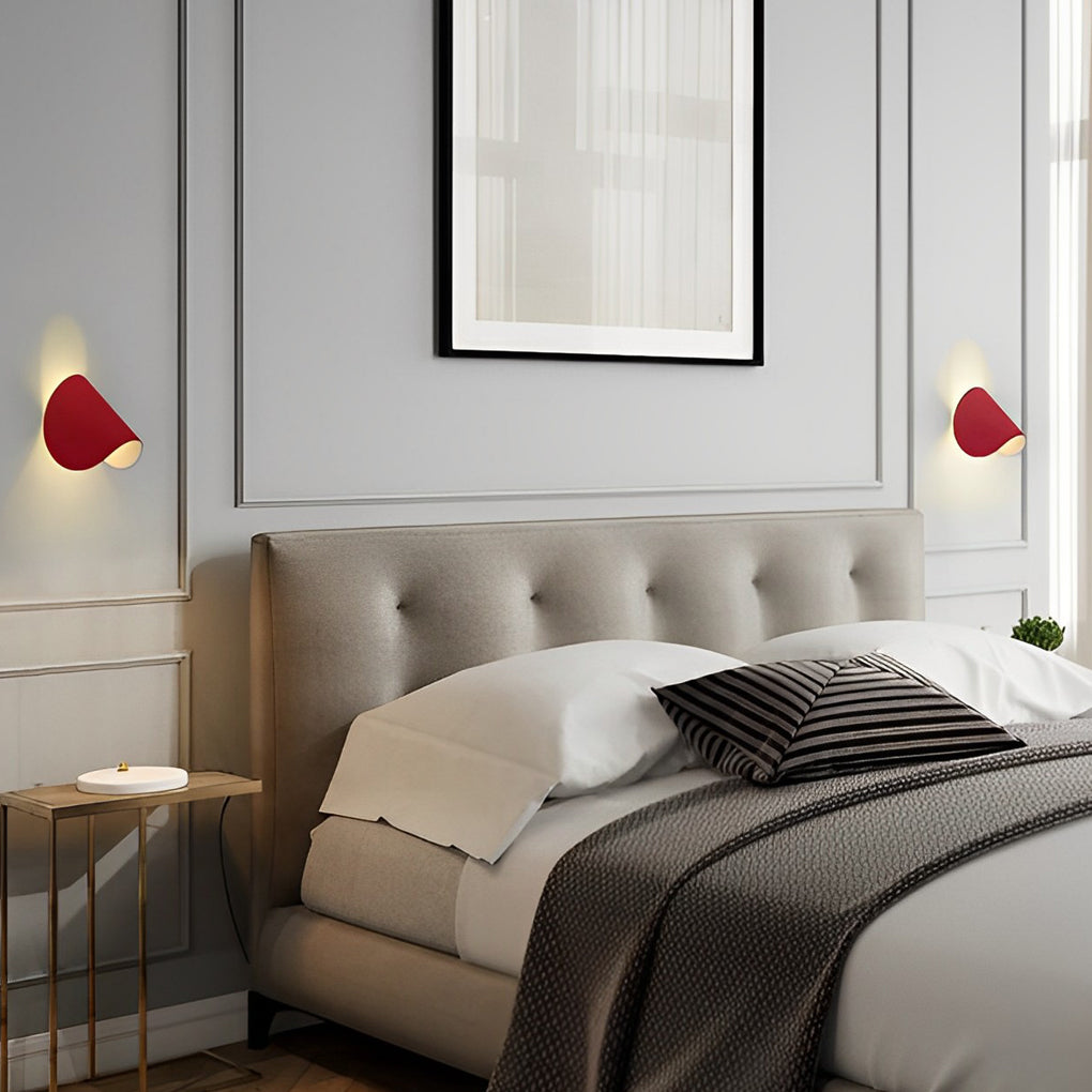 Folding wall sconce enhancing a modern staircase with warm light.