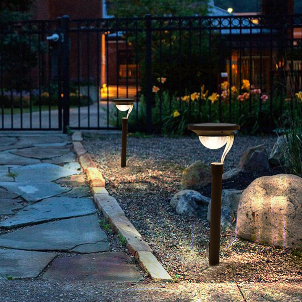 Garden stake solar lights enhancing a garden path with a modern design.