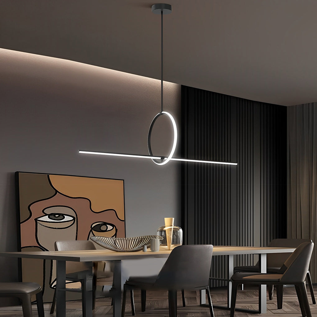 Geometric pendant light fixture with a bold circular design, hanging in a modern interior with dark walls.