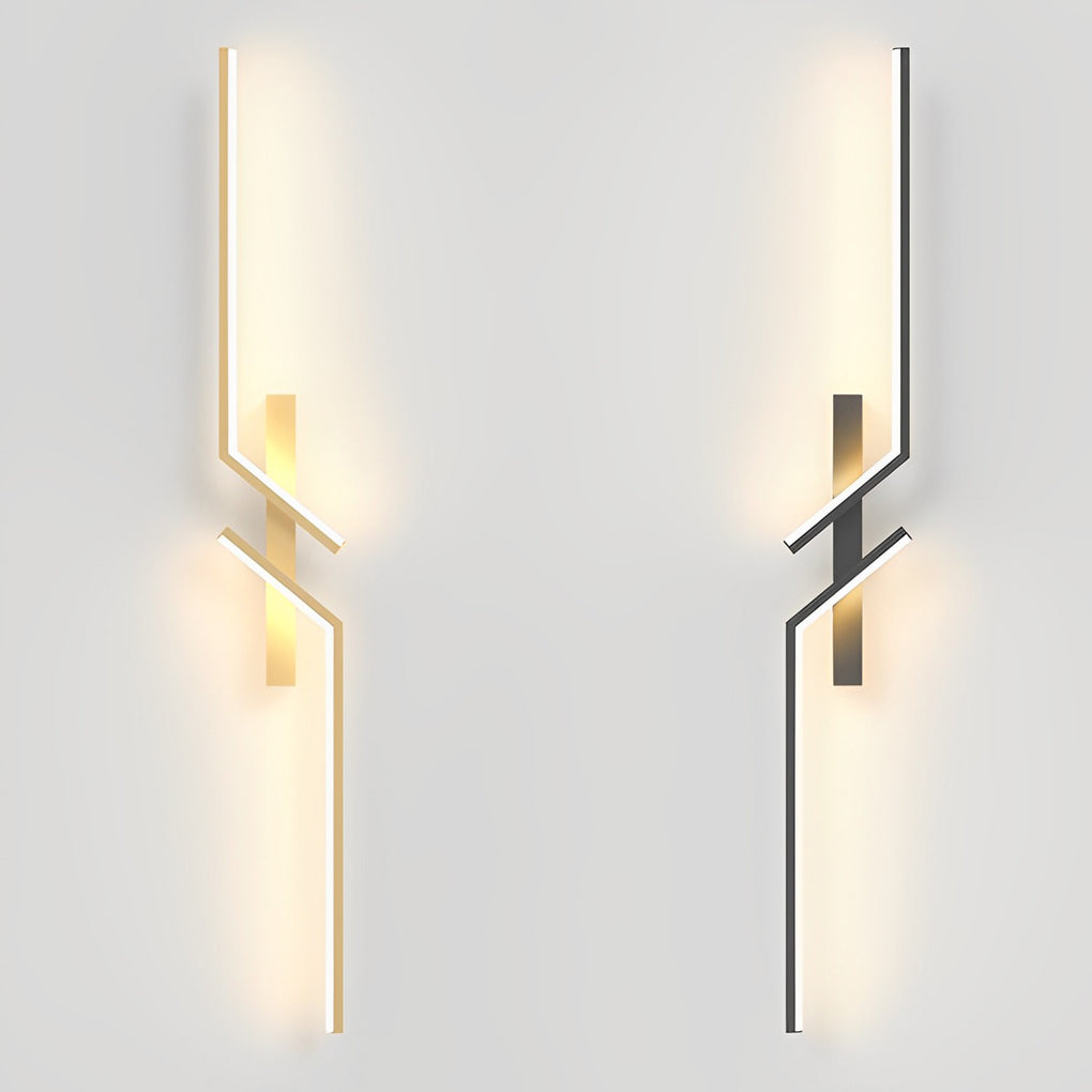 Geometric wall sconce with a black and gold finish, providing focused lighting.