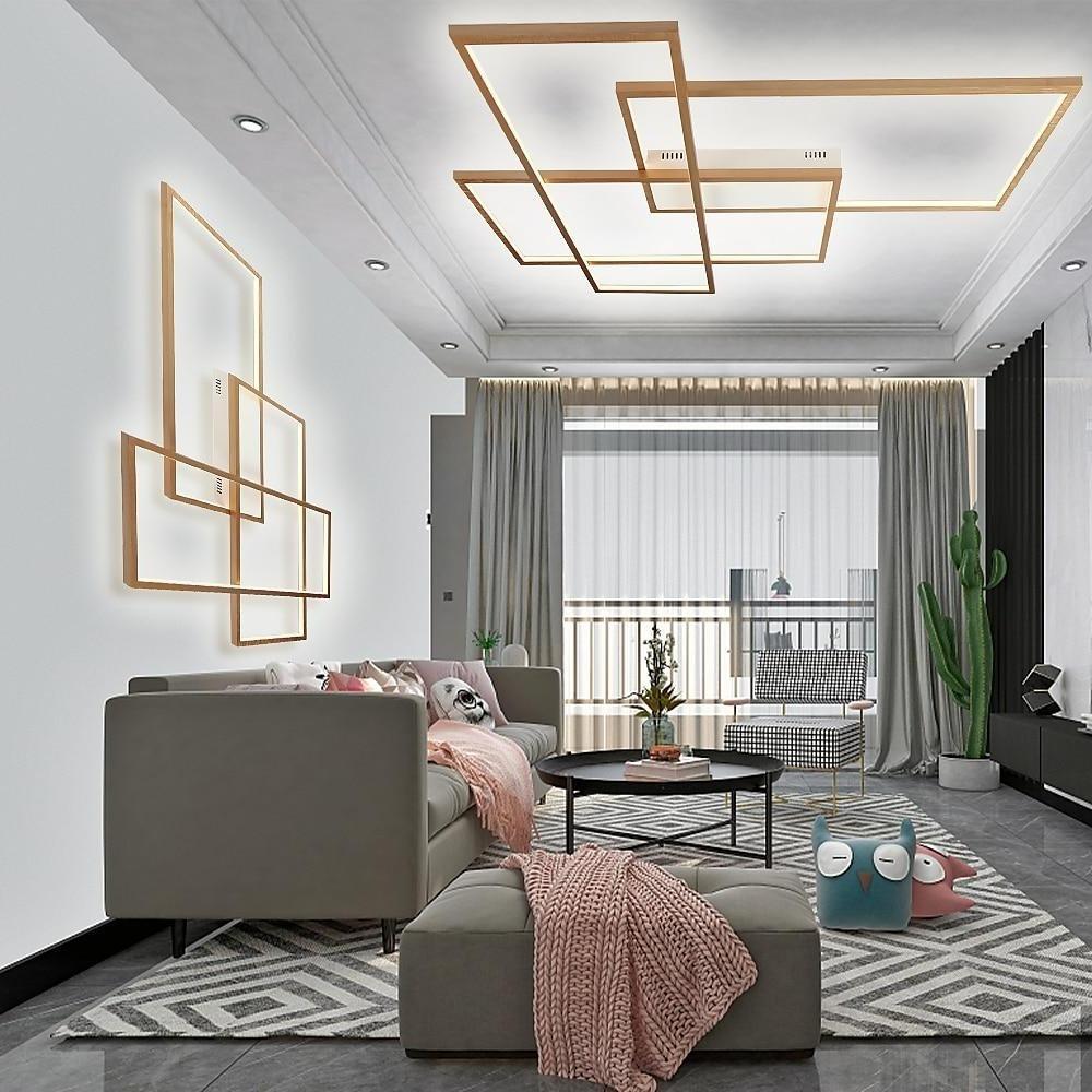 Geometric wall sconce in gold, side view of the elegant design.