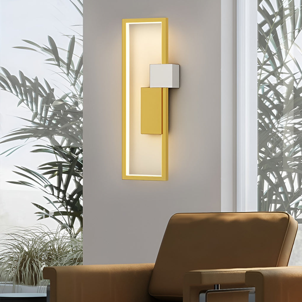 Geometric wall sconce light providing elegant illumination for a contemporary bedroom.