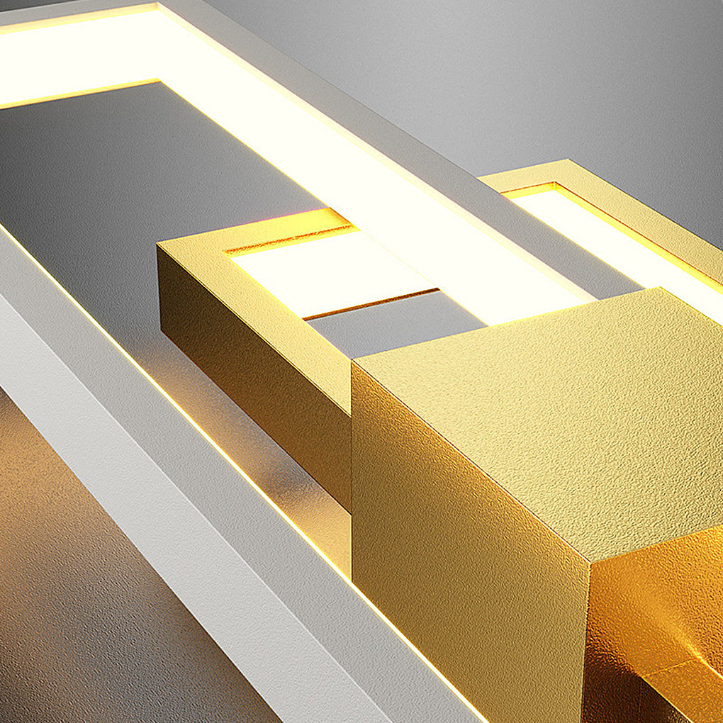 Geometric wall sconce light with detailed view of its gold and black finish.