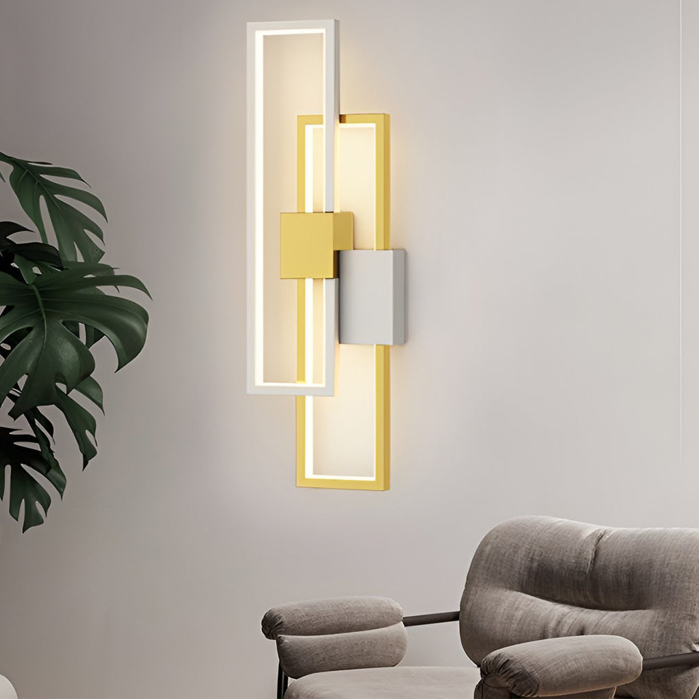 Geometric wall sconce light illuminating a minimalist interior with focused glow.