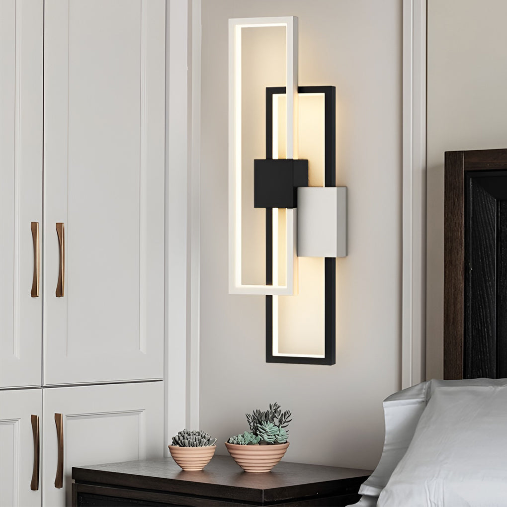 Geometric wall sconce light providing soft illumination in a stylish hallway.