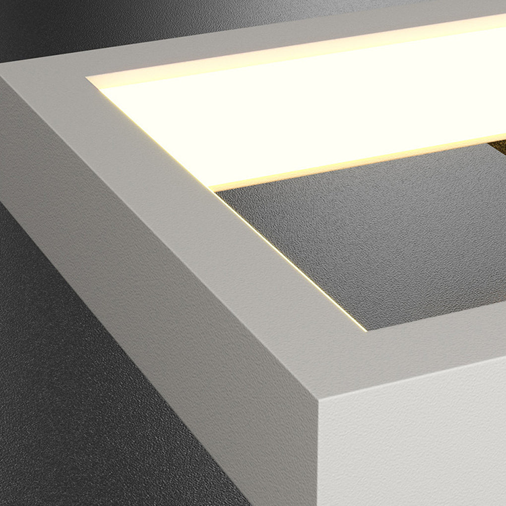 Geometric wall sconce light with white and gold accents for modern interiors.