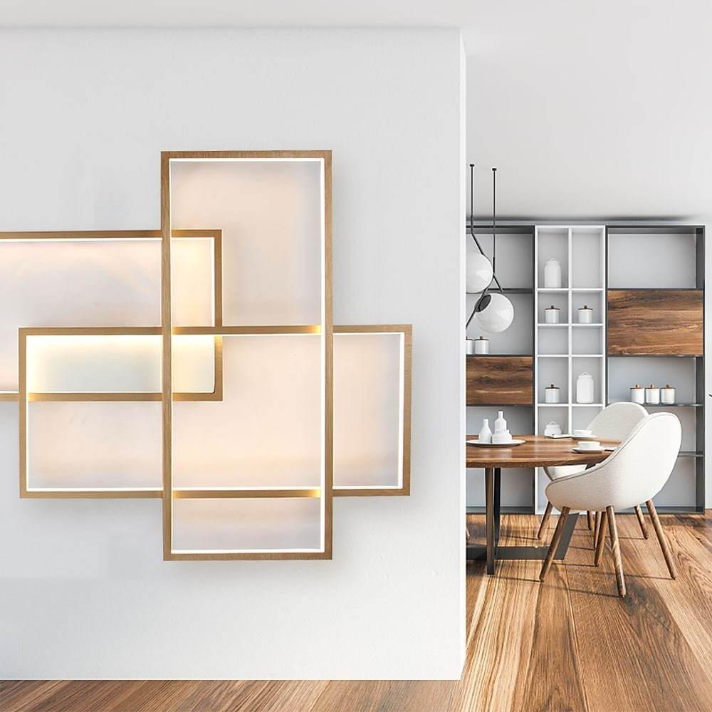 Modern geometric wall sconce with clean angular design and soft ambient glow