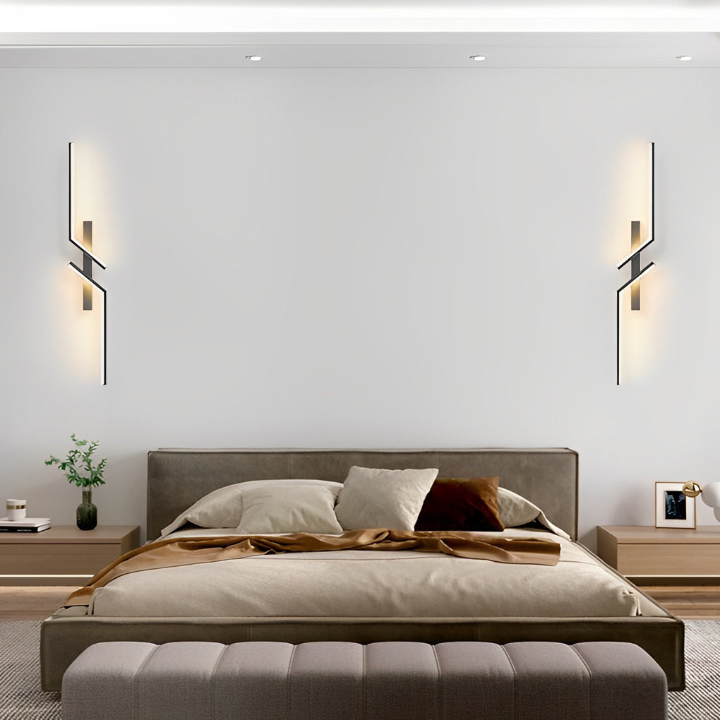 Geometric wall sconce with a sleek design, installed in a minimalist living room.