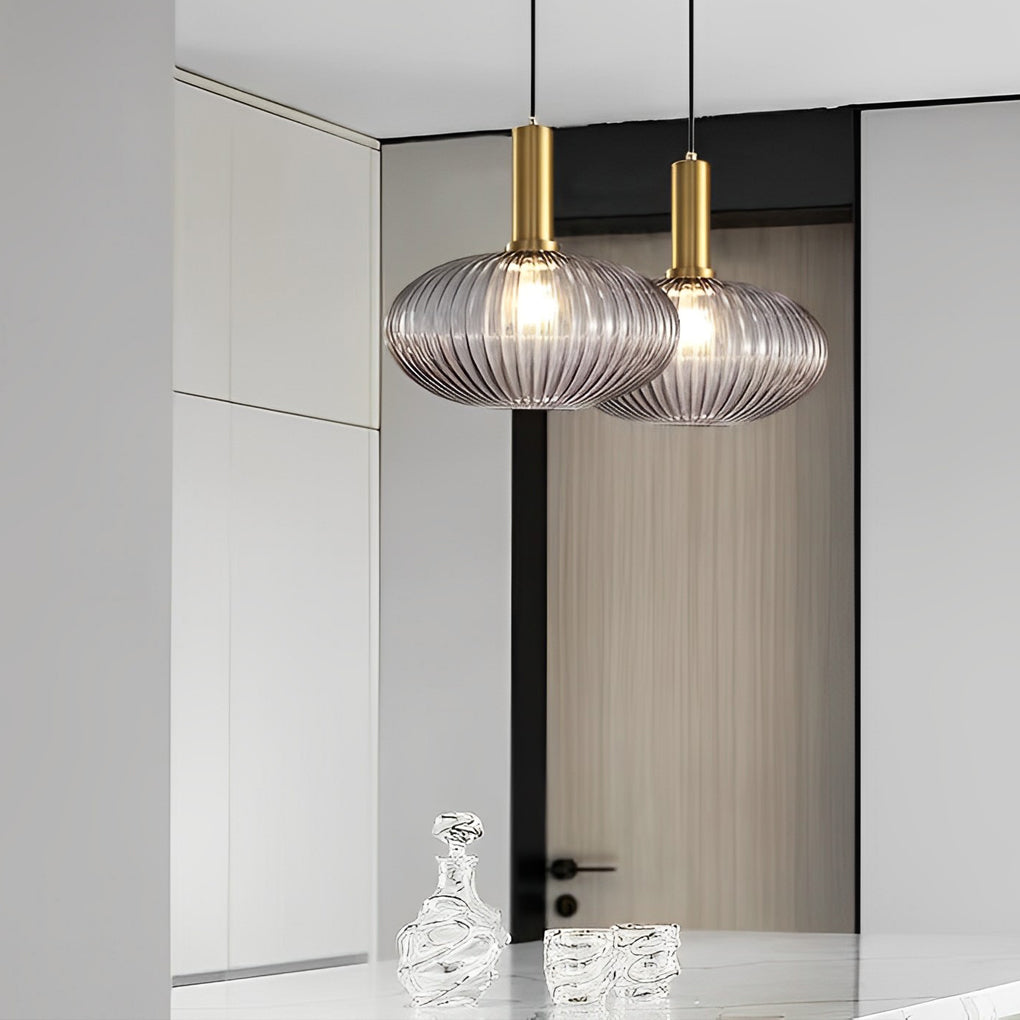 Glass lantern chandelier adds a touch of luxury to your home with clear glass shades and sleek ceiling mounting.