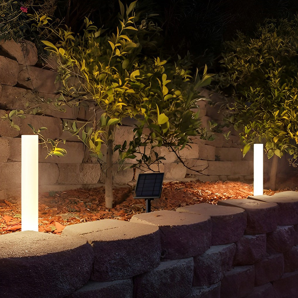 Glowing pillar light with close-up of its sleek design and light output.