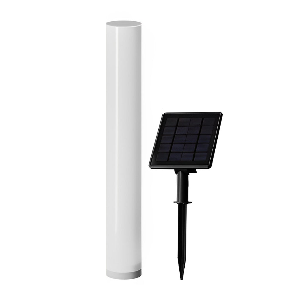 Glowing pillar light with multiple units arranged for modern outdoor lighting.