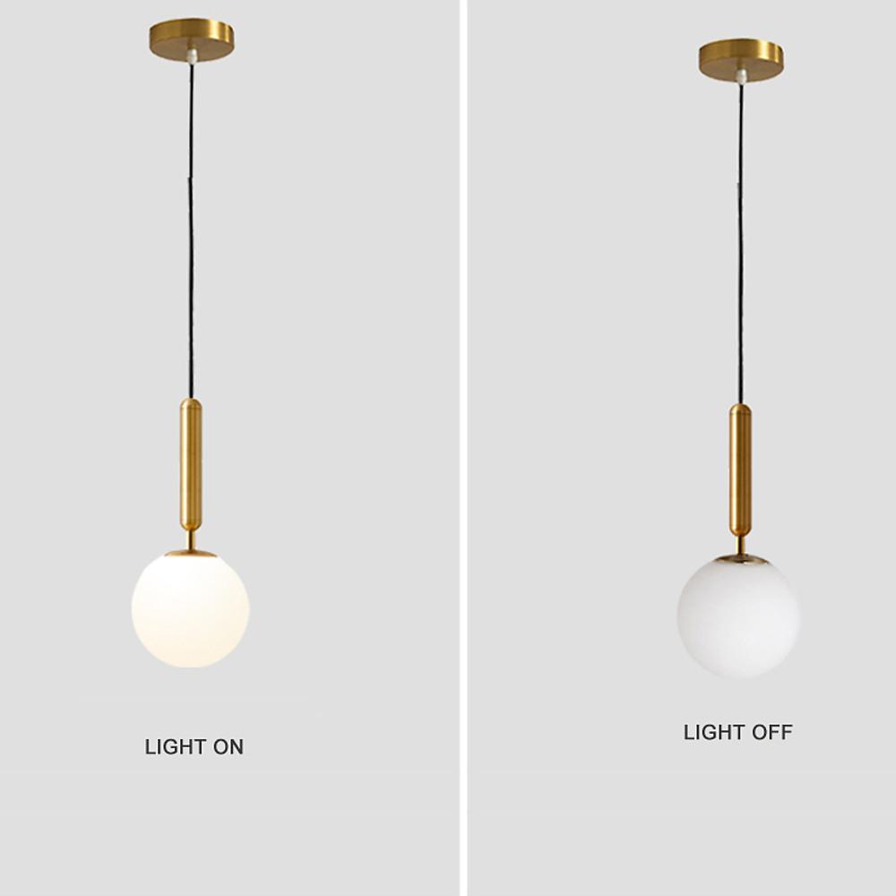 Functional gold hanging lights comparison showing the warm light on versus off visuals.