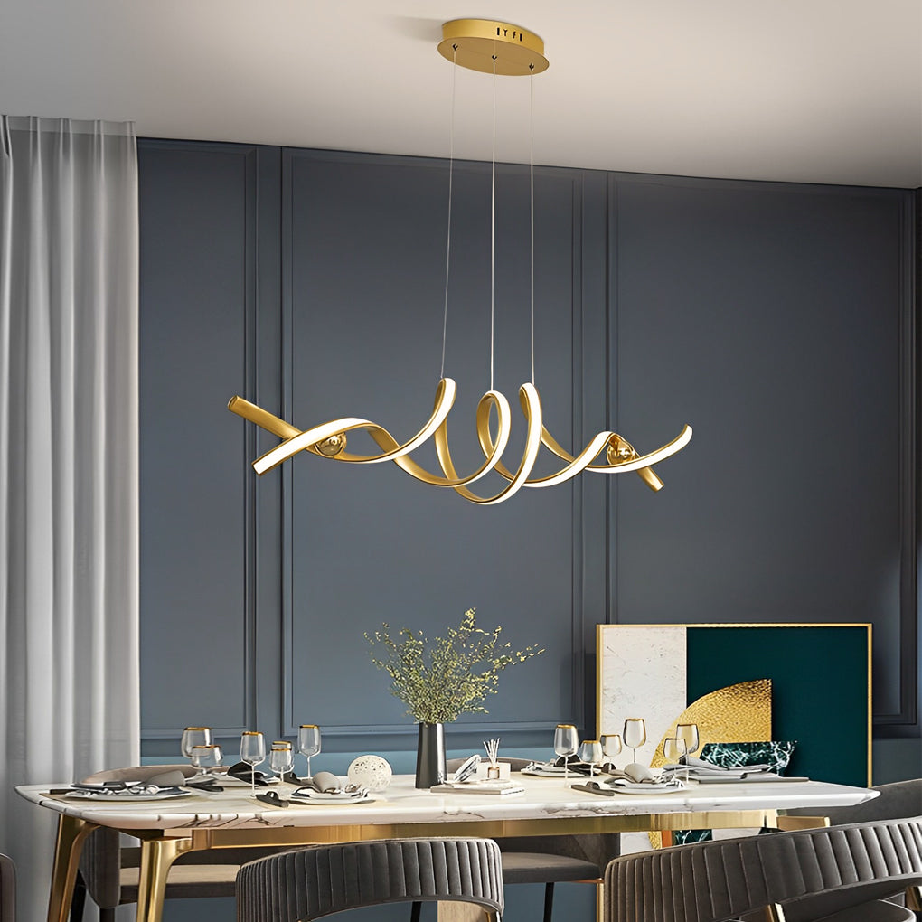 Gold spiral ceiling light hanging above a dining table with dark walls.