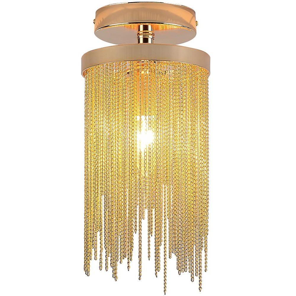 Gold tassel chandelier flush mount isolated on a white background with cascading crystal fringe.