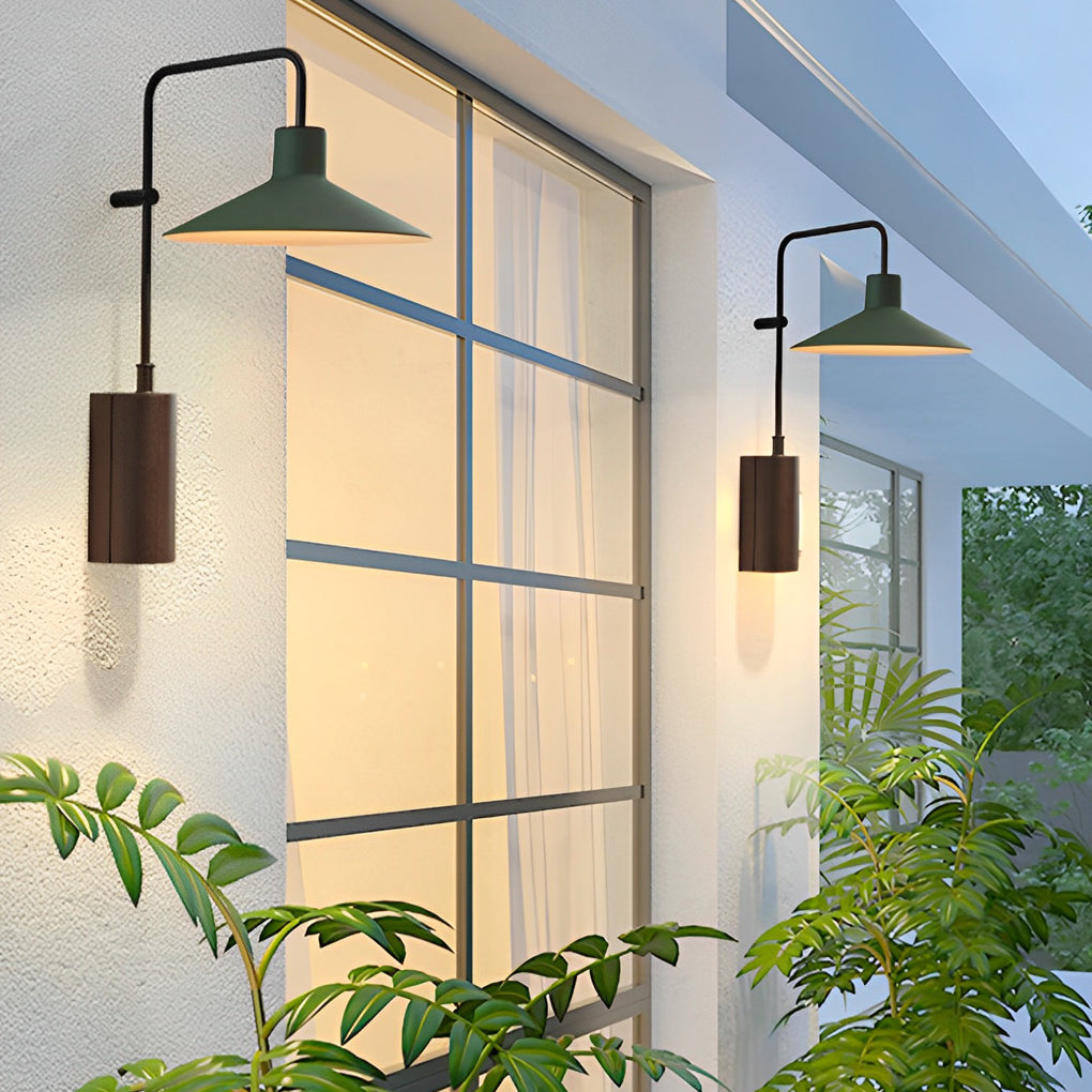 Gooseneck wall lamp beside a modern window, providing soft illumination for a clean and contemporary exterior facade.