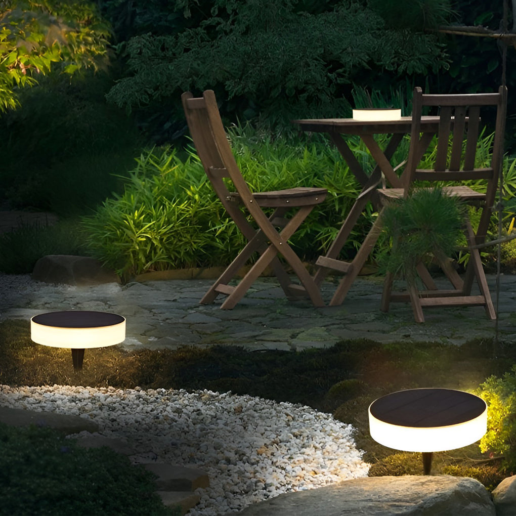 Ground solar lights with close-up of its sleek design and light output.