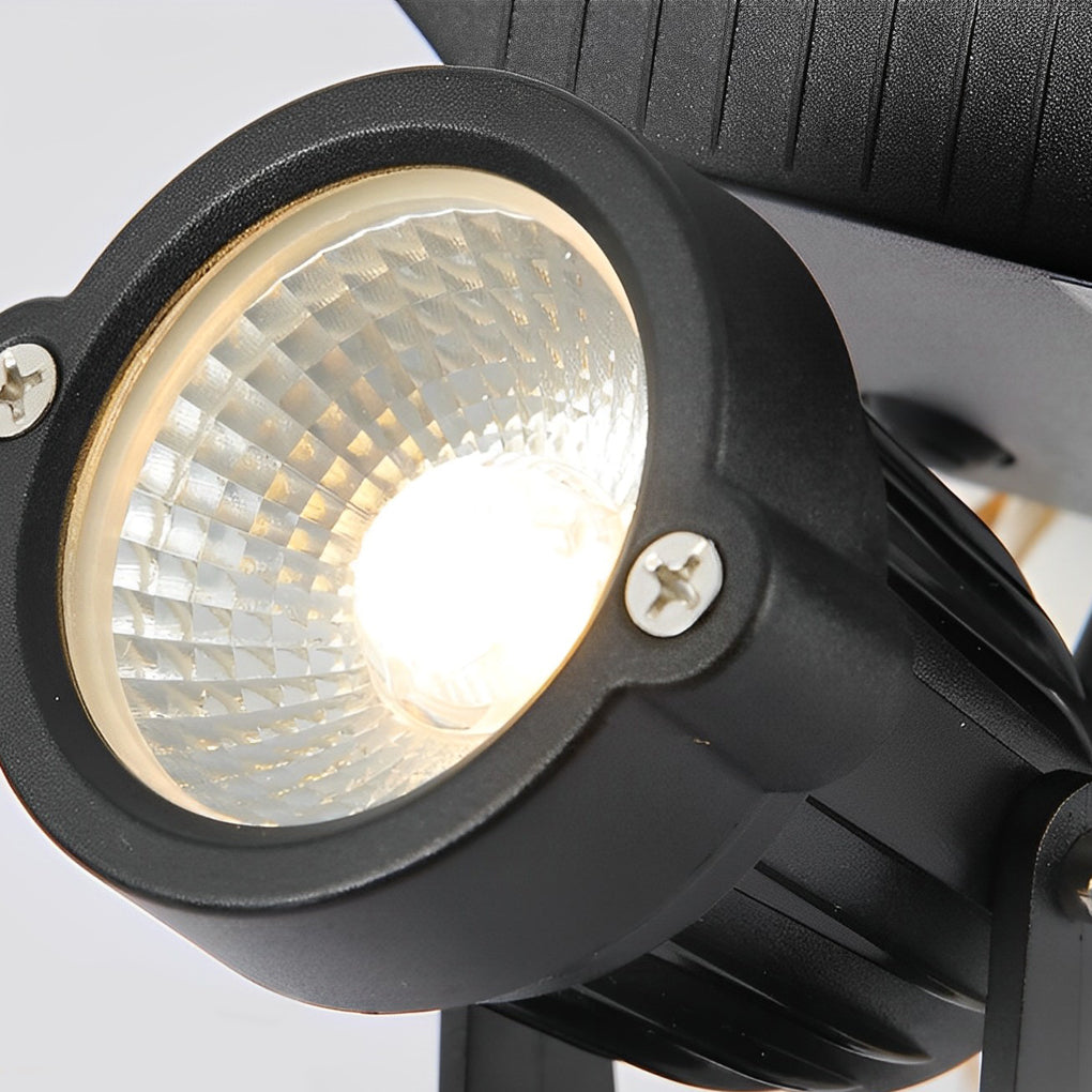 Ground spike solar lights shown as a full product with stake, adjustable arm, and solar panel attached.