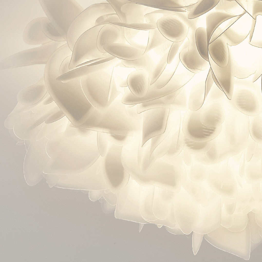 Close-up of a hanging petal light, highlighting its intricate petal structure and soft glow.