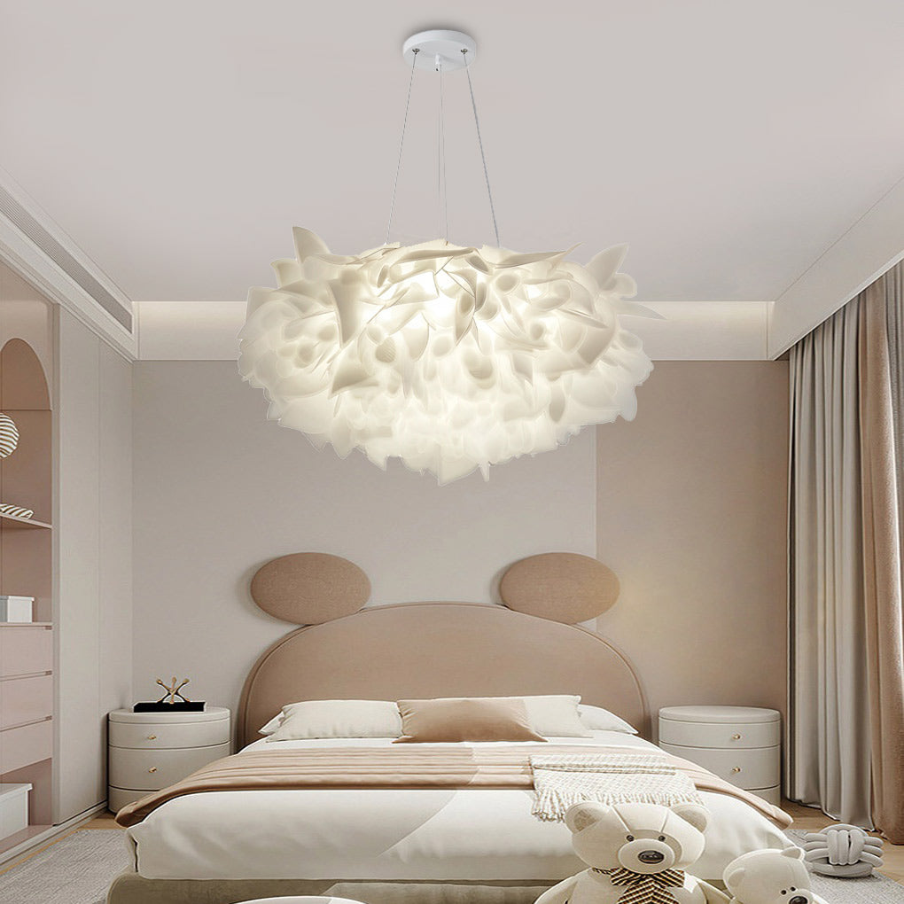 Hanging petal light providing soft lighting in a modern bedroom with neutral tones.