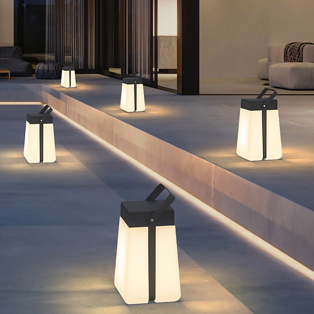 Hanging solar lantern lights lining modern outdoor steps, providing functional and atmospheric pathway lighting.