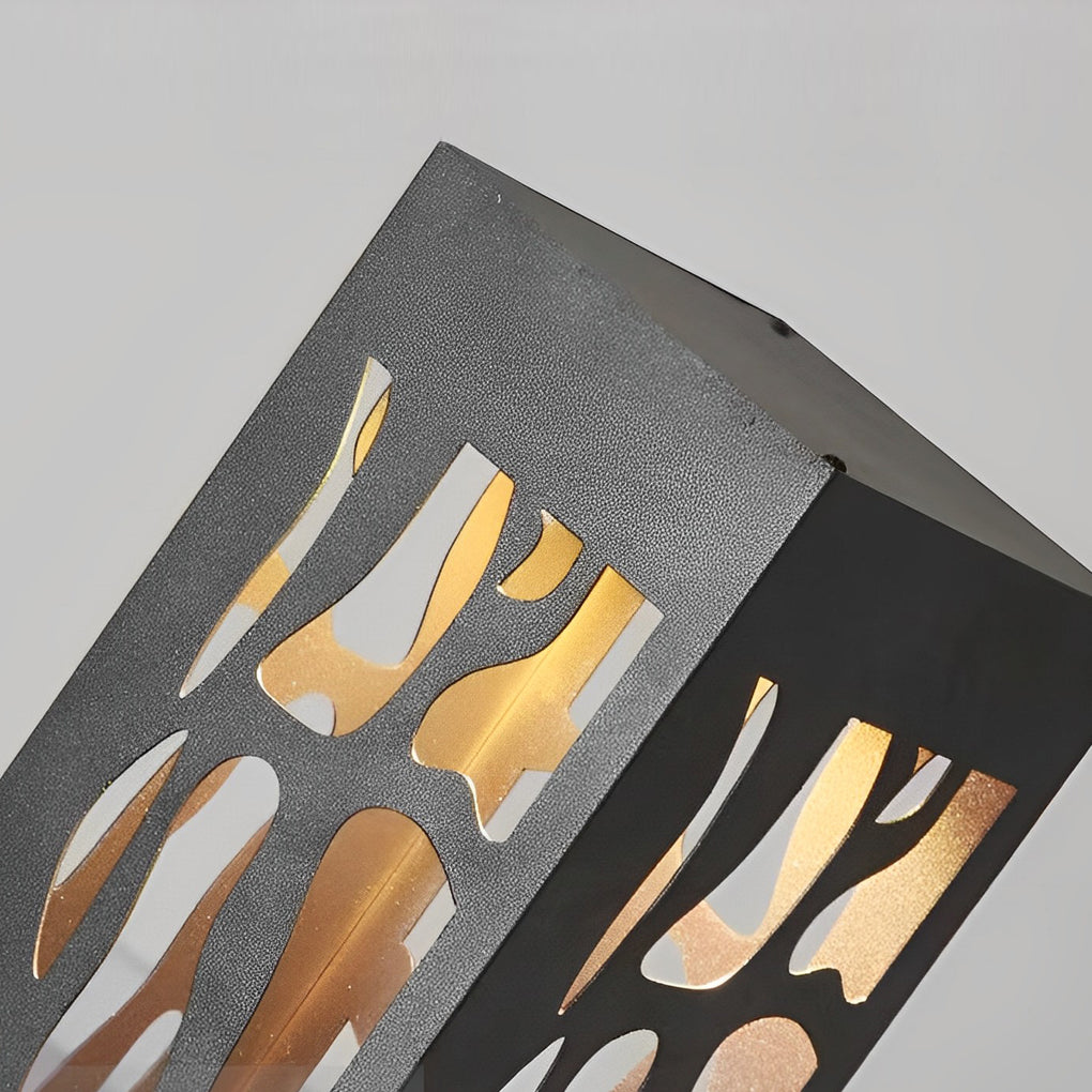 Close-up of hollow outdoor landscape lighting metal surface with precision cutout design.