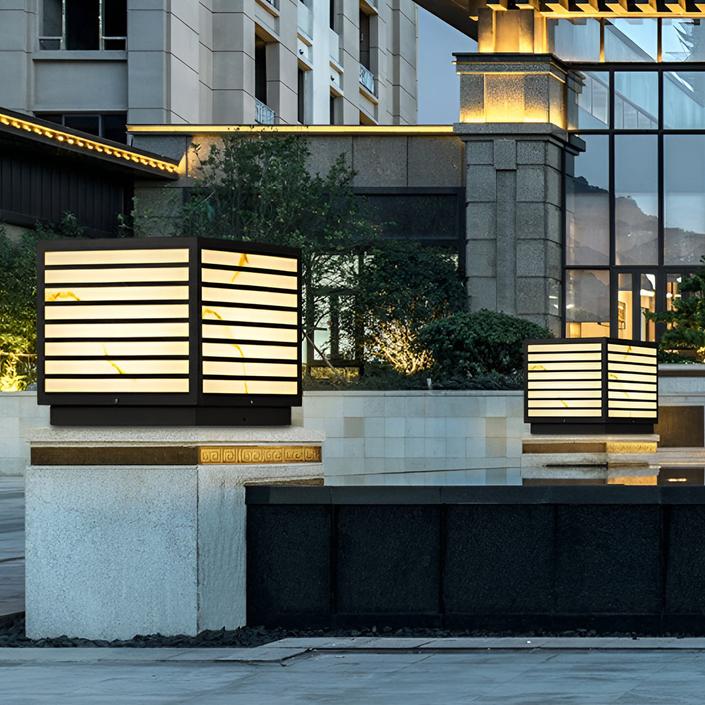 Home pillar light illuminating modern residential exterior columns