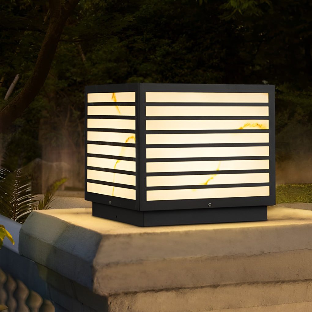 Home pillar light mounted on stone column top in yard