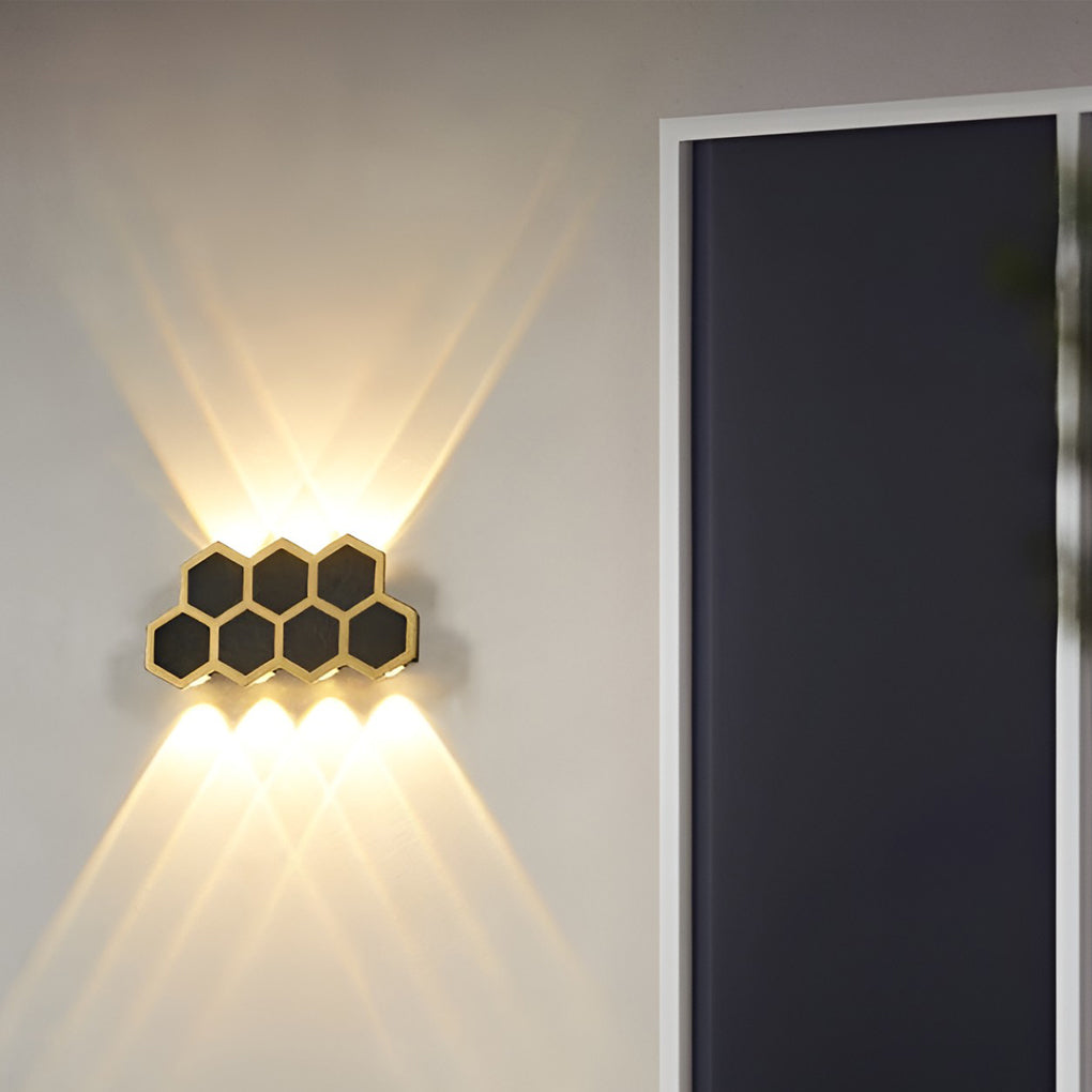 Honeycomb LED lights wall providing elegant illumination for a contemporary patio.