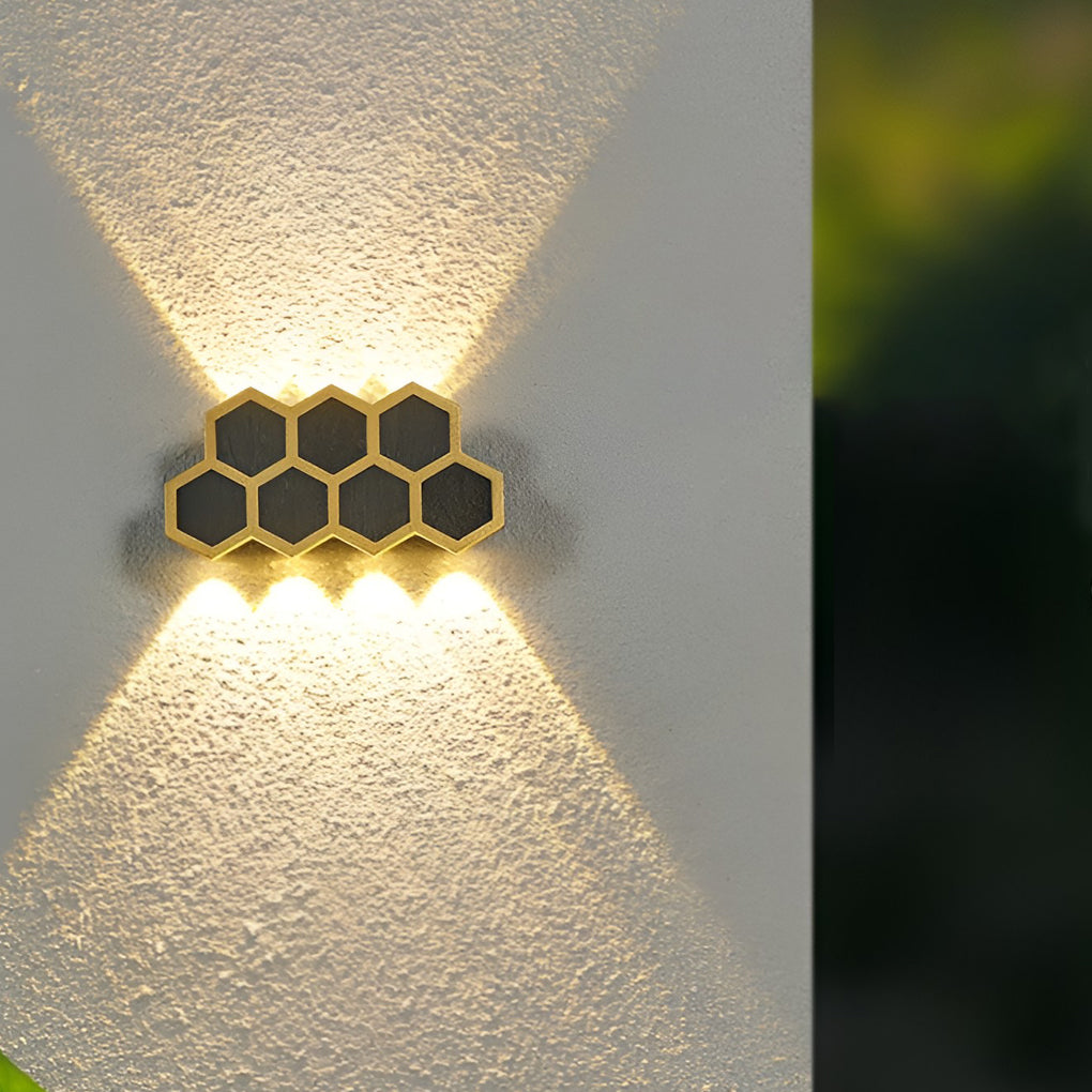 Honeycomb LED lights wall enhancing a stylish outdoor wall with ambient light.