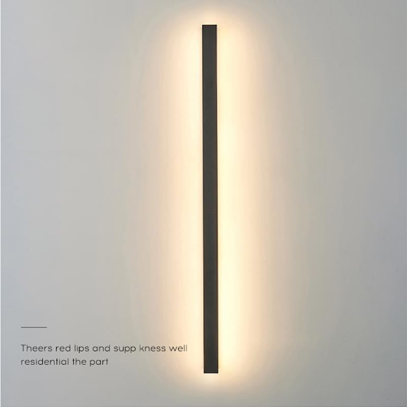 Horizontal long outdoor wall lights with LED glow, mounted above sofa for ambient indoor lighting.