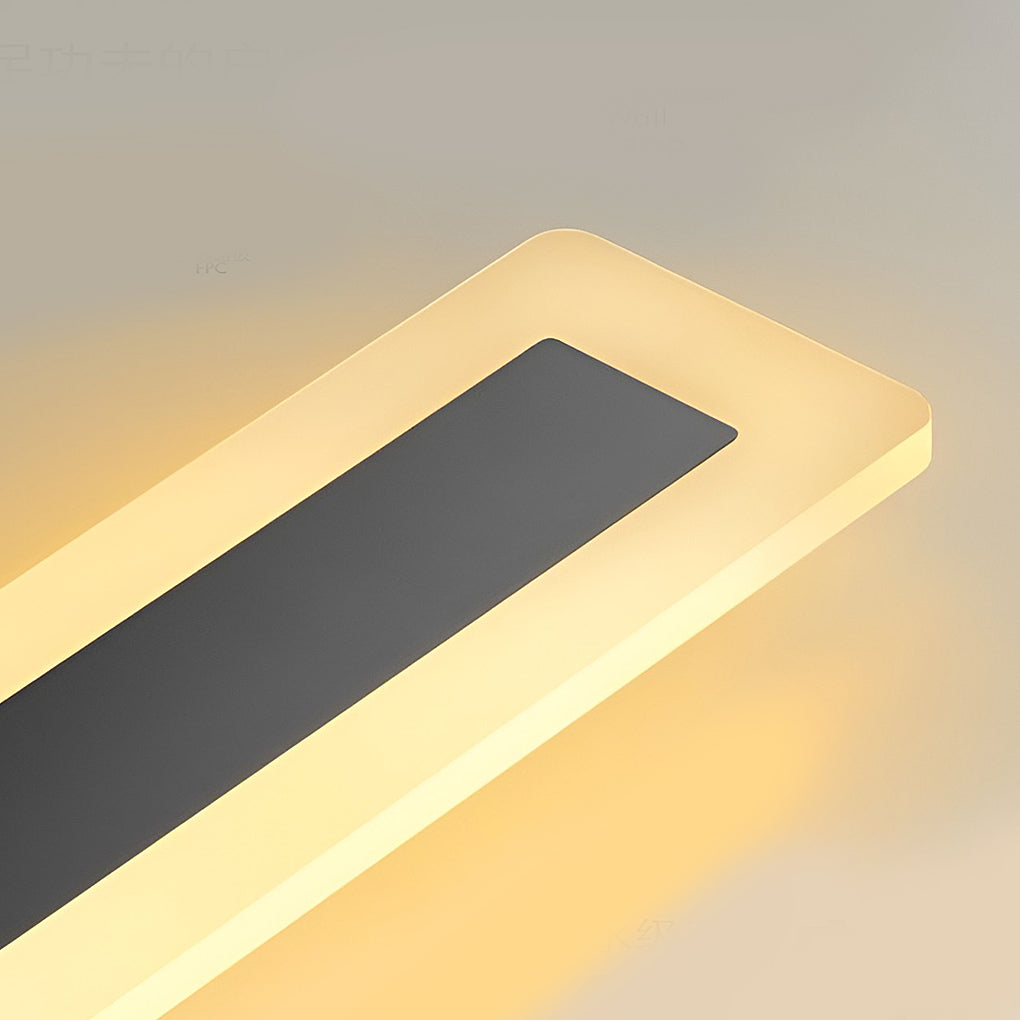 Acrylic wall sconce with horizontal light strip, mounted on light wall for modern and understated ambiance