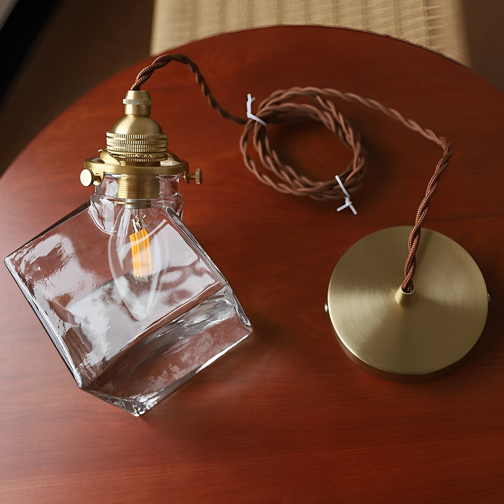 Ice cube pendant light components including ceiling canopy and cord.