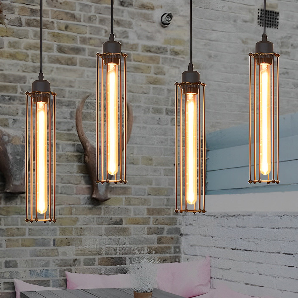 Industrial style pendant light fixtures in a vertical cluster, showcasing exposed filament bulbs against a textured brick wall.