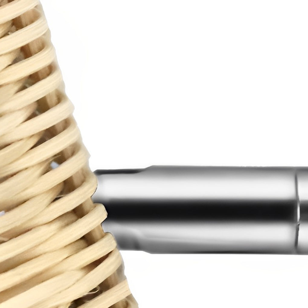 Close-up of a Japanese wall light, showcasing the intricate woven rattan shade and gold mounting hardware.