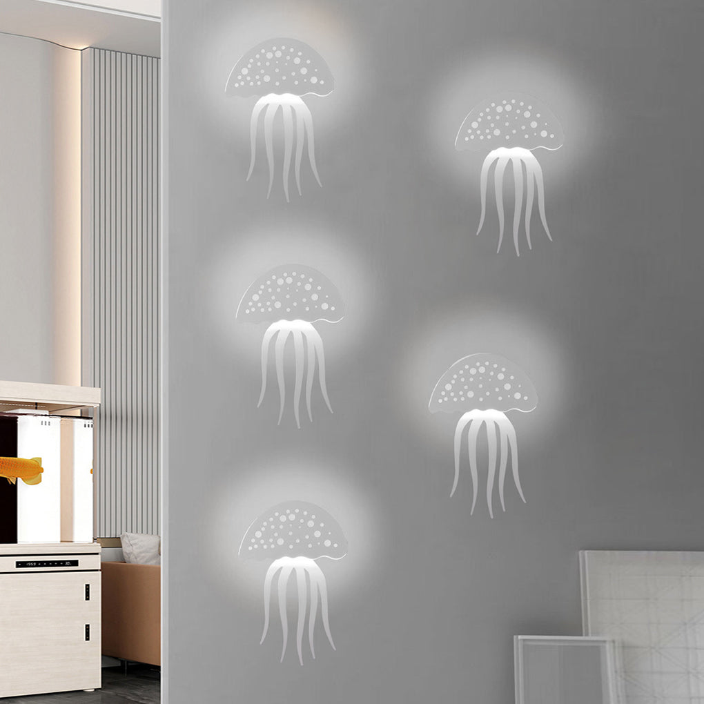 Multiple jellyfish wall lights arranged as wall art installation.
