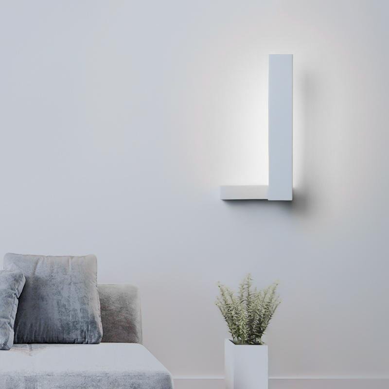 L shape wall light mounted vertically on wall in modern interior.