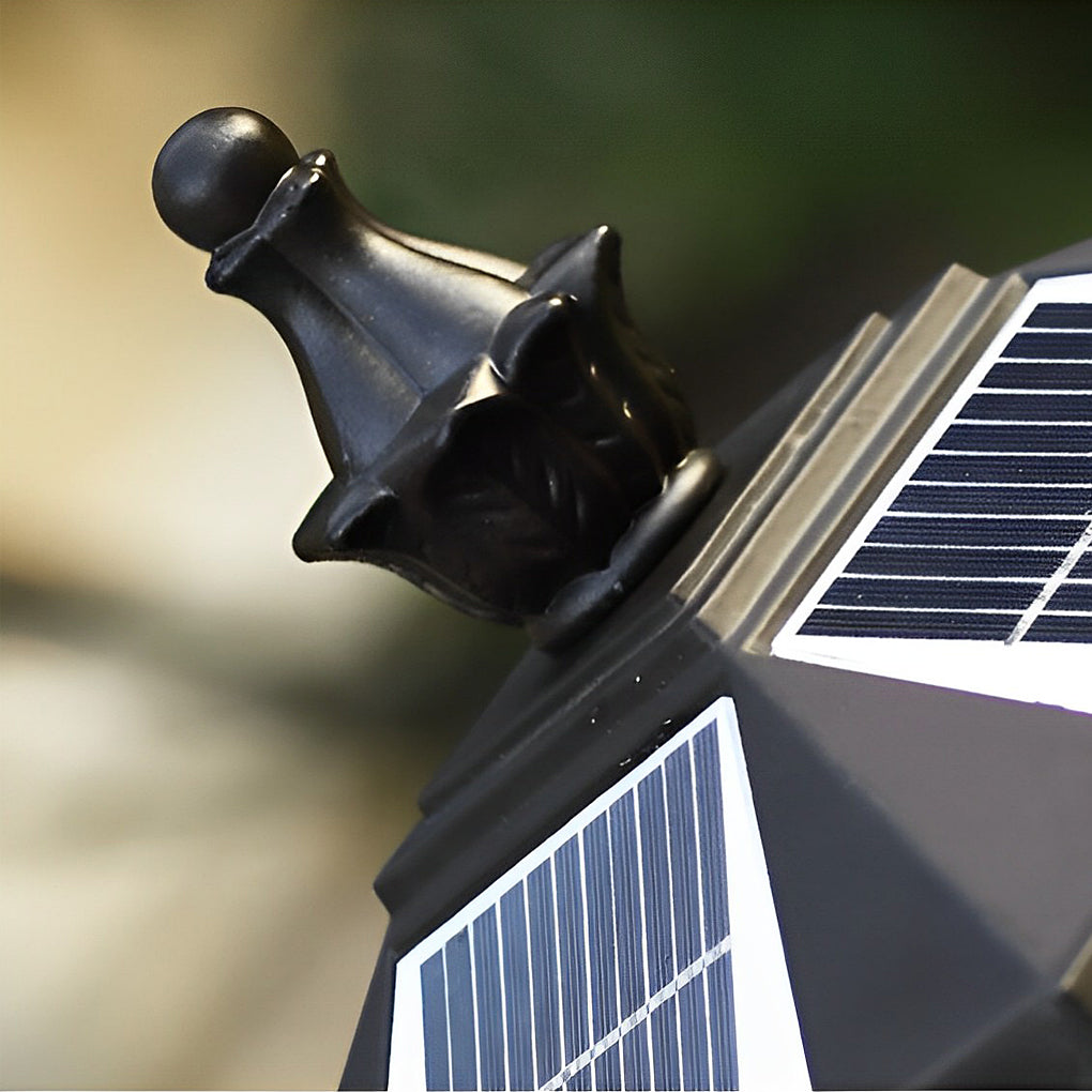 Lantern pillar lights top detail showing decorative finial and integrated solar panel.