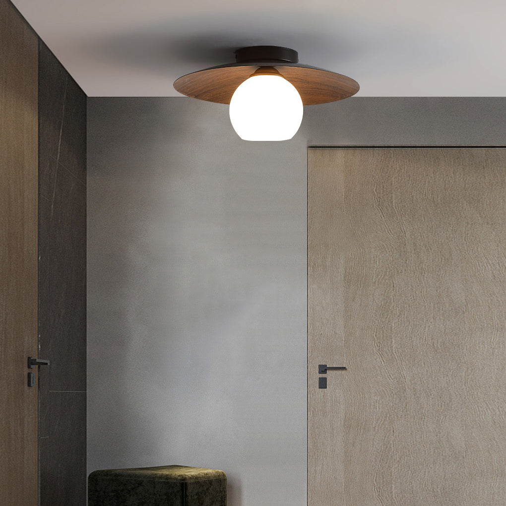 LED ceiling light with wood grain accents, mounted in a hallway for stylish and cozy lighting.