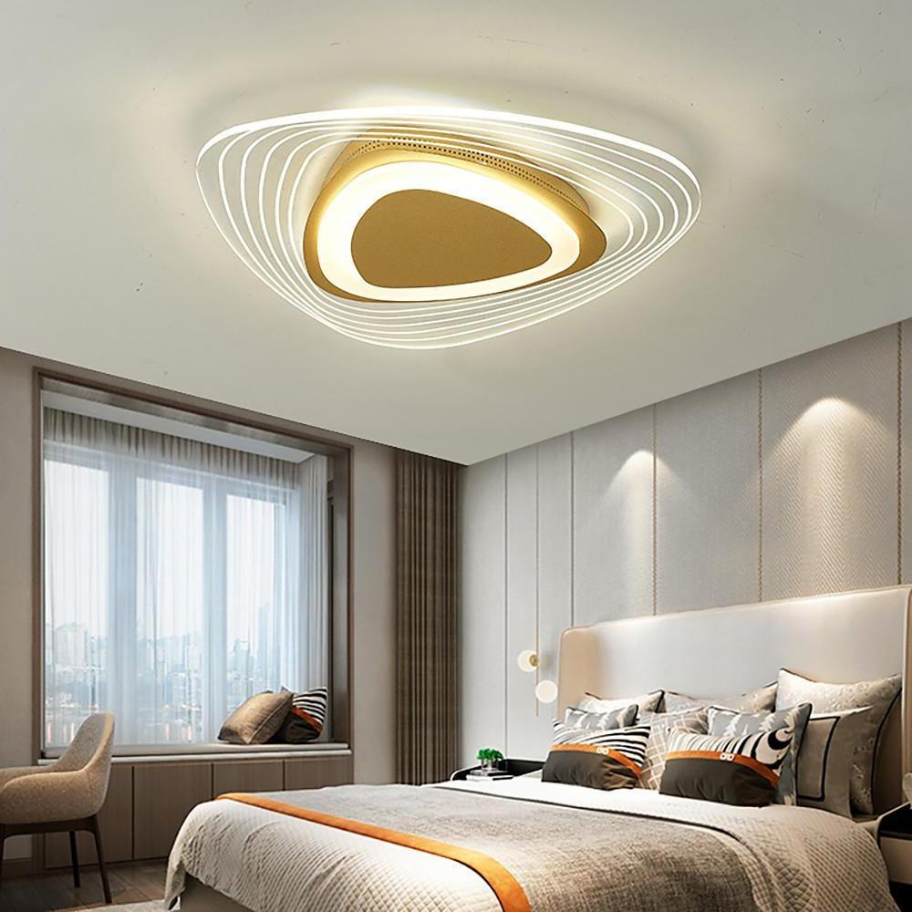 Triangle led ceiling lights used in a stylish bedroom with neutral color tones.