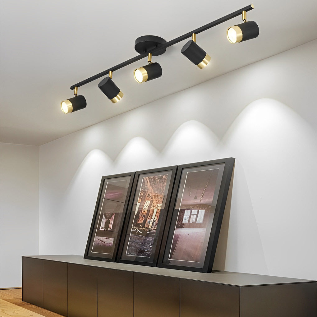 LED ceiling track spotlights with adjustable heads, installed in a modern kitchen.