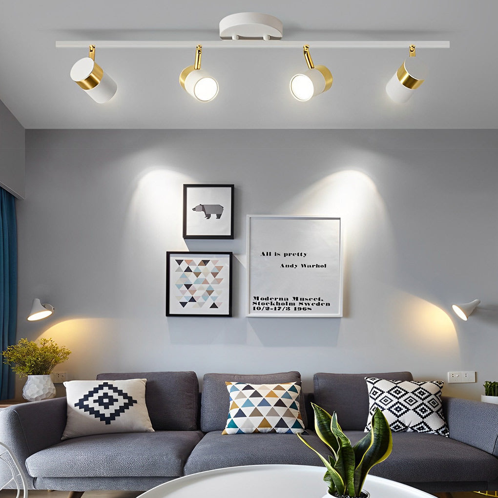 LED ceiling track spotlights with a white finish, providing ambient lighting in a cozy bedroom.