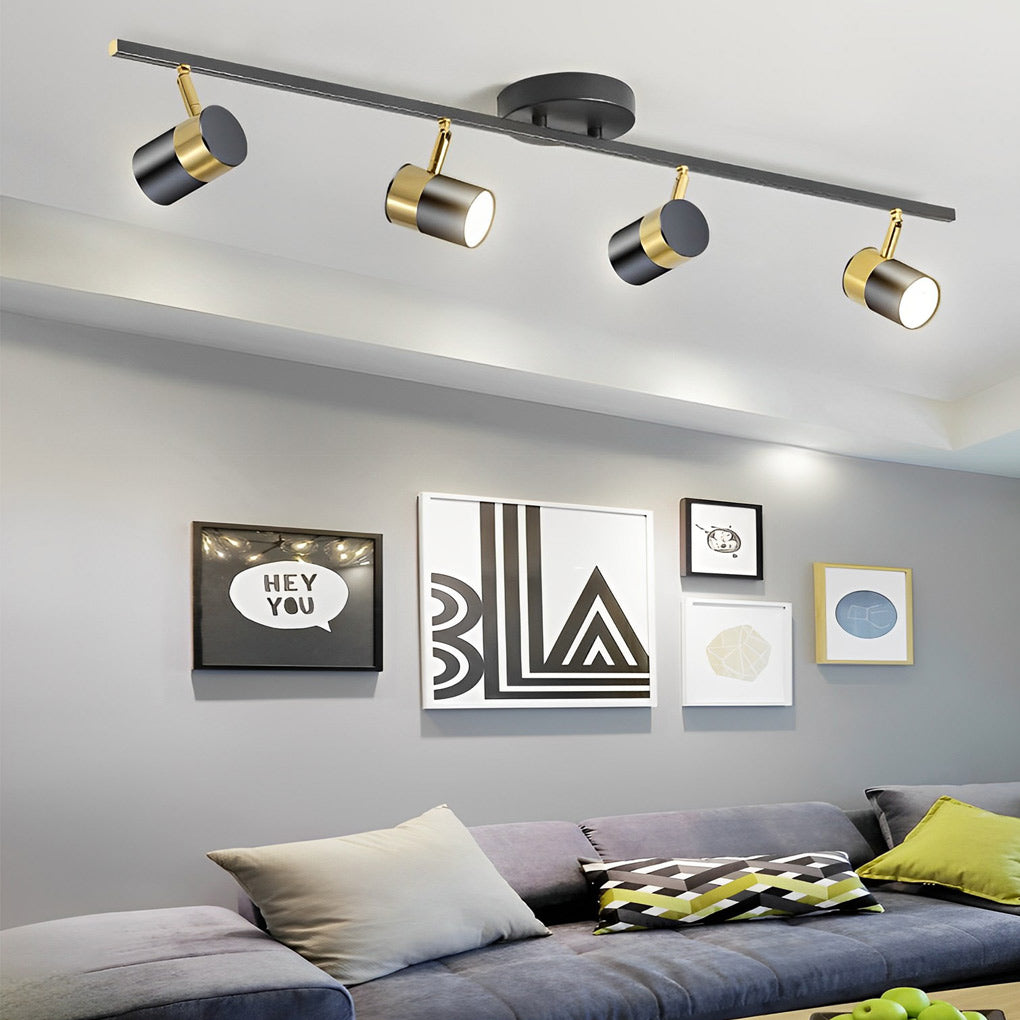 LED ceiling track spotlights with a white track, illuminating a modern living room.
