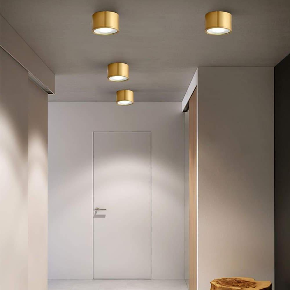 LED downlights evenly spaced across a clean white ceiling.